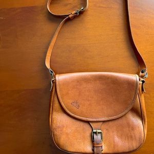 Handmade leather purse made in Tolfu, Italy
